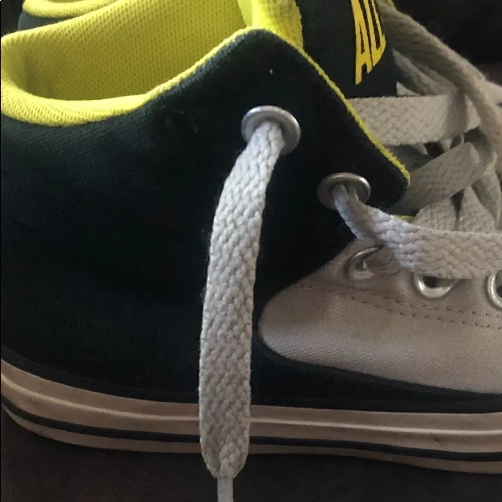 Boys all-star converse sneakers size 1 black and yellow.
